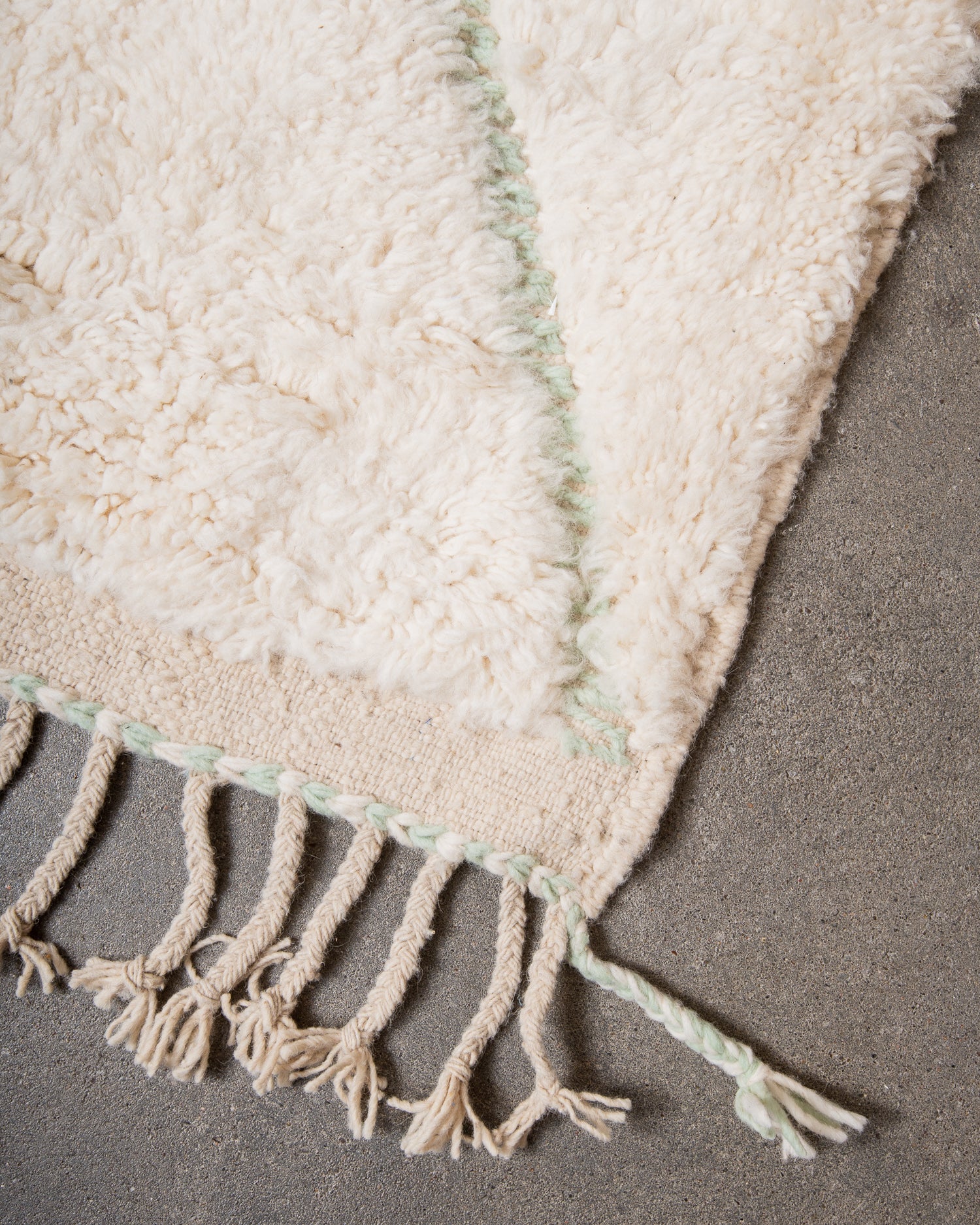 Modern, designer, handcrafted Berber rug from Morocco. Beniourain carpet with beautiful colours and patterns and fluffy wool texture.